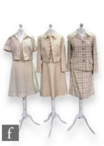 Three 1960s vintage two piece suits, comprising a Maidmoiselle cream polyester mini dress with