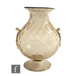 An early 20th Century Italian Murano pale gold glass vase in the manner of Vittorio Zecchin for