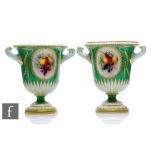 A matched pair of Richard Seabright Royal Worcester porcelain urns, dated 1906, pattern number 2157,
