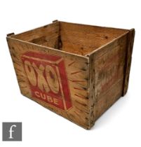 A 1960s OXO wooden crate, with printed red  OXO designs, 46cm high, 63cm x 49cm deep.