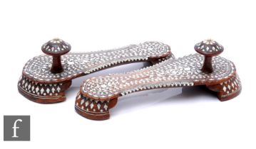 A pair of 19th Century Northern Indian Hoshiapur, shisham wood toe-knob wedding sandals, elaborately