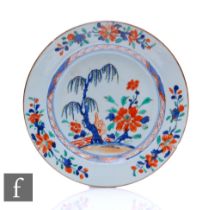 An 18th Century Chinese export porcelain dish, decorated in the imari palette, with willow tree
