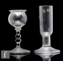 An early 19th Century clear crystal glass oil lamp  of spherical form with a double inverted