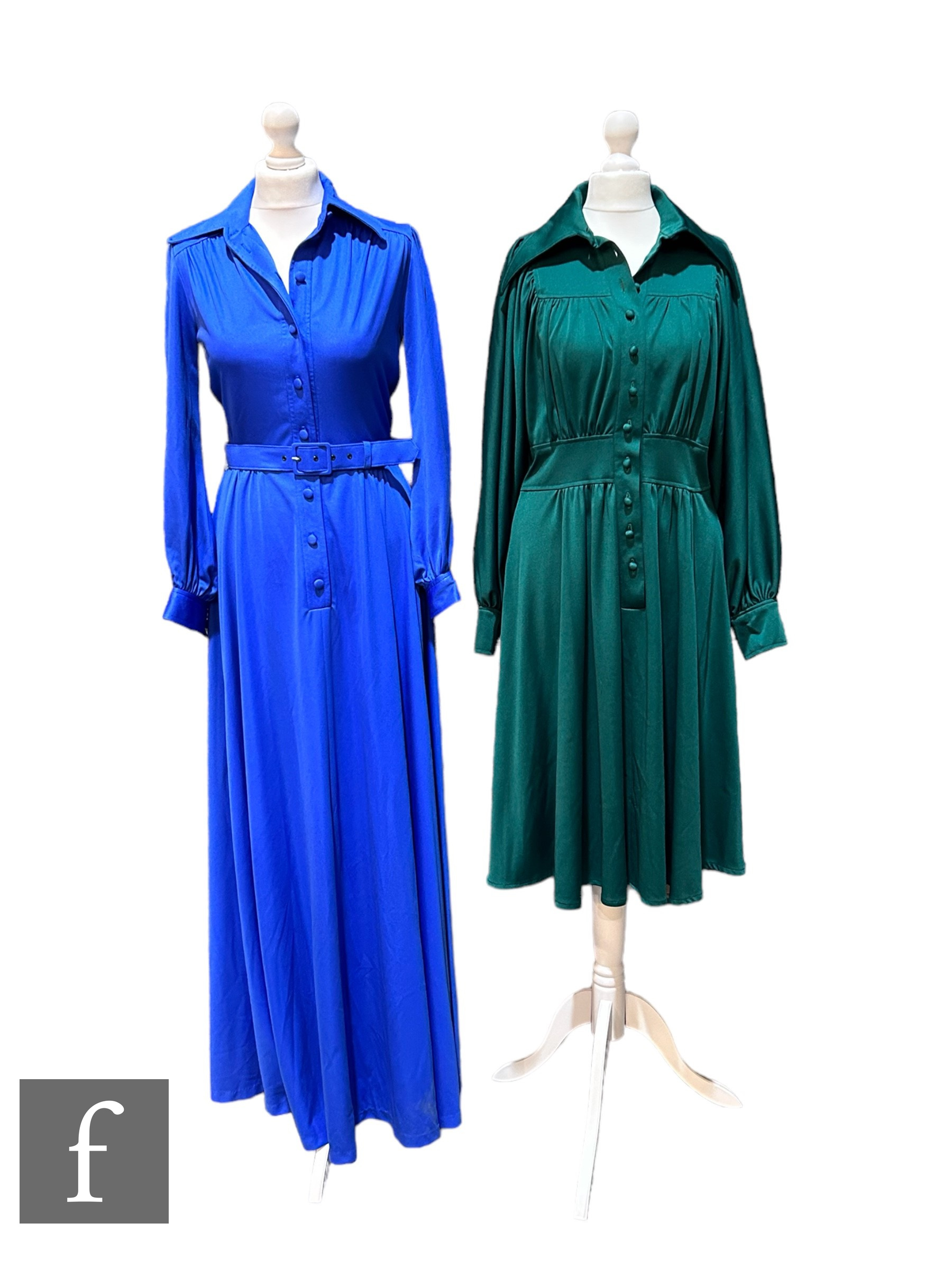Two 1970s vintage dresses, to include a deep green jersey with balloon sleeves, vertical panel of