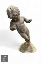 A 19th Century lead garden figure of a young boy, on naturalistic base, height 59cm, damaged.
