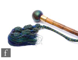 An early 20th Century walking cane in the manner of Kralik, with a petrol iridescent sphere finial