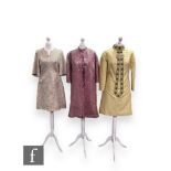 A 1960s vintage coat and dress co-ord, the fitted sleeveless mini dress with square neckline, the