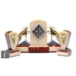 A French Art Deco clock garniture by Leonard Roussel for Laval (Heurtebize), the arched cream and