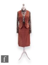 A 1960s/70s corduroy waistcoat and pencil skirt co-ord, all in a peach ground, together with a sheer