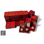 A collection of thirty nine various boxed Halcyon Day enamel boxes, mainly year and Christmas boxes.