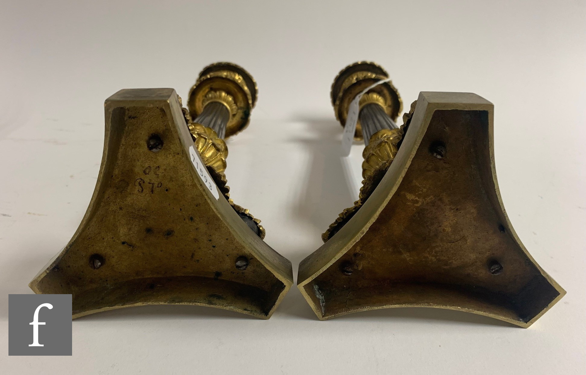 A pair of late 19th Century French Empire style candlesticks, gilt acanthus leaf sconces on paw feet - Image 2 of 2
