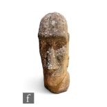 A carved sandstone Easter Island head, height 68cm.