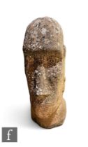 A carved sandstone Easter Island head, height 68cm.