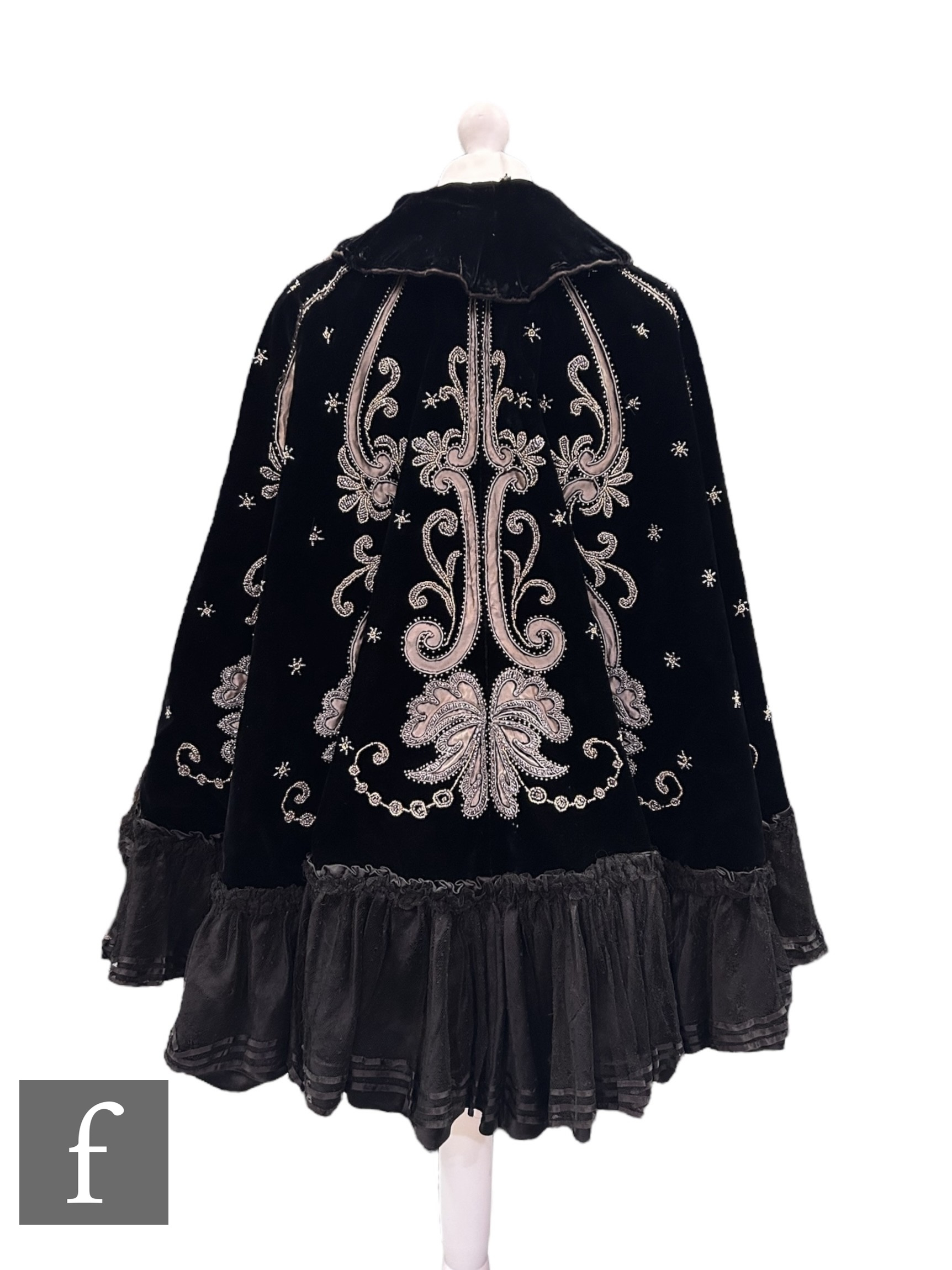 A late 19th Century black velvet evening cape, decorated with bead and grey silk foliate scroll - Image 2 of 2