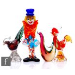 A group of mid 20th Century Murano glass figures, to include a stylised clown, a sommerso stylised