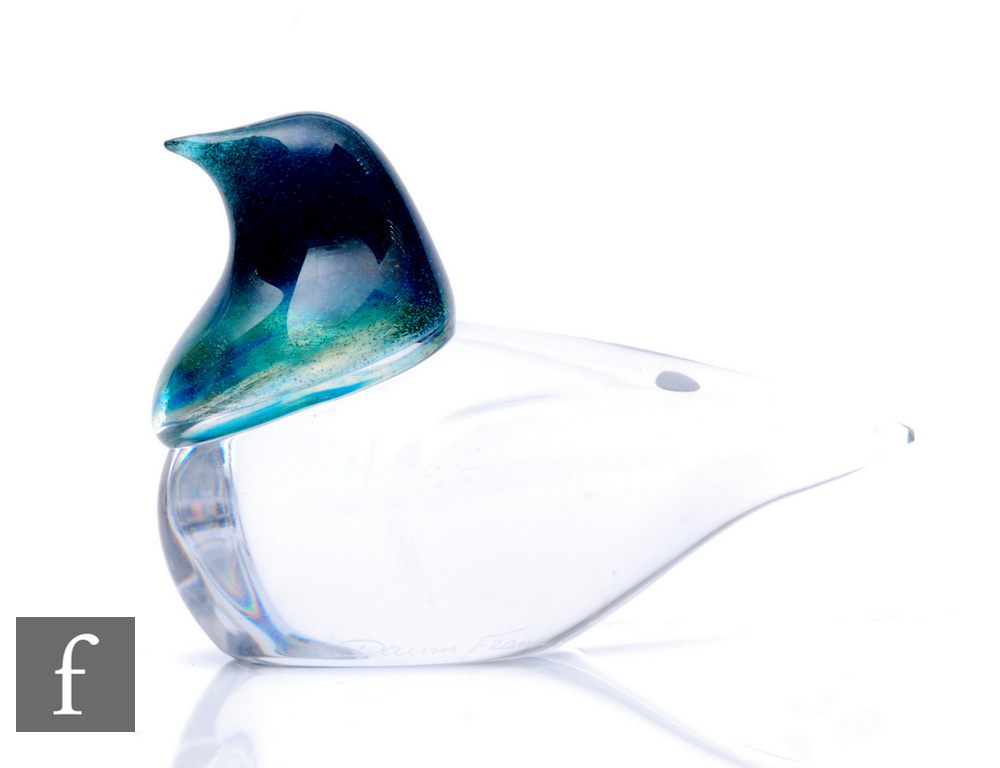 A 20th Century Daum clear crystal glass figure, modelled as a stylised bird, decorated internally to