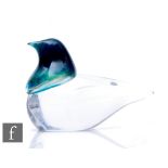A 20th Century Daum clear crystal glass figure, modelled as a stylised bird, decorated internally to