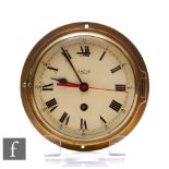 A Smiths Astral brass circular bulkhead clock.