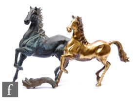 A 20th Century bronze model of a prancing horse, height 41cm, and a similar brass prancing horse,