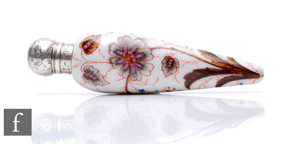 An early 20th Century glass lay scent bottle of torpedo form, the opaque glass painted with