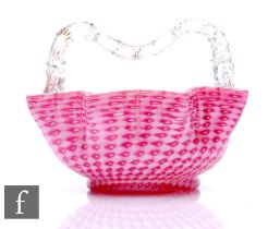 A large late 19th Century Stourbridge glass basket, the footed circular bowl rising to a zigzag