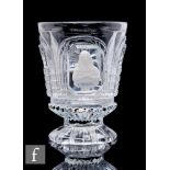 A mid 19th Century Baccarat pressed glass footed beaker, circa 1840, the cylinder bowl decorated