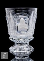 A mid 19th Century Baccarat pressed glass footed beaker, circa 1840, the cylinder bowl decorated