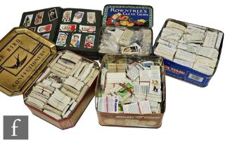 A cigarette card album containing early single and part sets by Wills, Players and others, also a