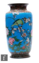A Japanese Meiji Period (1868-1912) cloisonne vase, of tapered ovoid form with everted rim, the blue