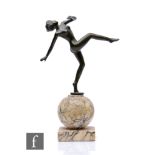 An 1830s Art Deco bronze figure of a female dancer in the manner of Lorenzl, raised to a