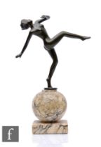 An 1830s Art Deco bronze figure of a female dancer in the manner of Lorenzl, raised to a