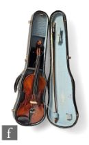 An early 20th Century three quarter size violin,  bearing the label The London Violin Co. Limited,