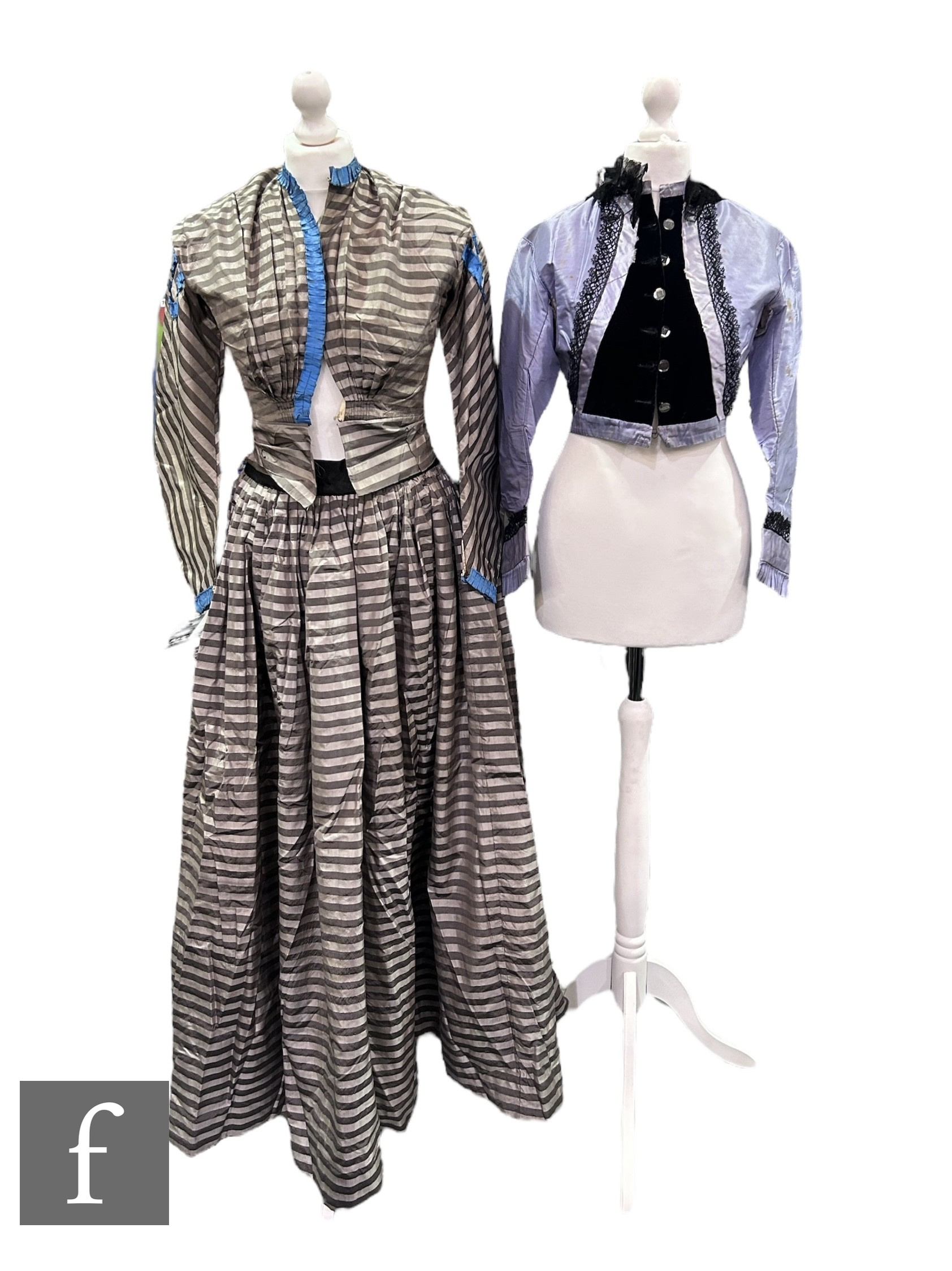 A Victorian lady's two piece dress, the jacket with blue ruffle trim over grey and silver stripe - Image 2 of 2