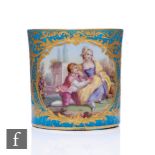 A 19th Century Sevres coffee can of cylindrical form, the front cartouche painted with an