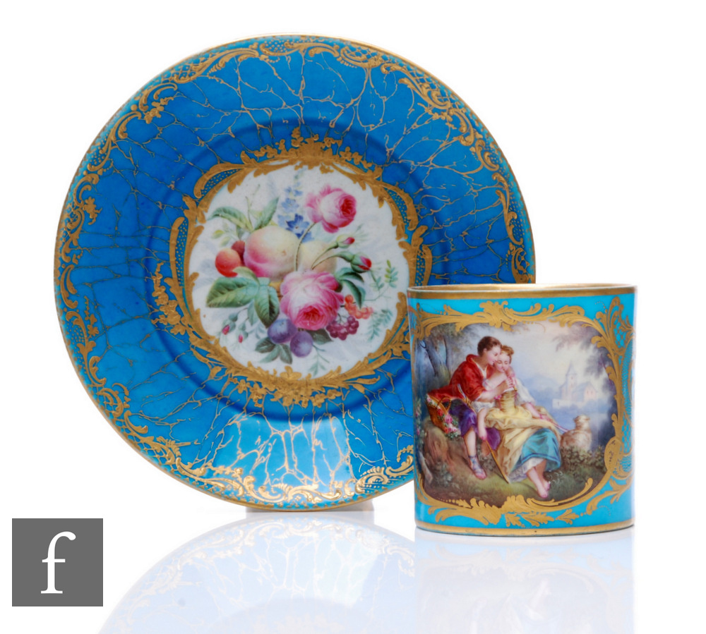 A 19th Century Sevres coffee can and saucer of cylindrical form with ear shaped handle and high