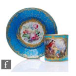 A 19th Century Sevres coffee can and saucer of cylindrical form with ear shaped handle and high