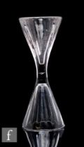 An 18th Century double ended dram glass with double conical fluted bowl, one standard and one