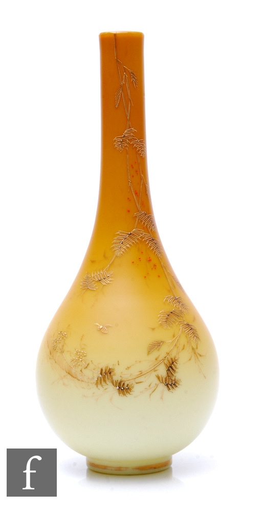 A late 19th Century continental glass vase by Harrach, of footed ovoid form with tall slender