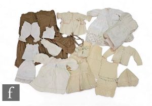 An assorted collection of late 19th and early 20th Century children and dolls clothing, to include a