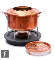 A 20th Century Henning Koppel for Georg Jensen Danish copper fondue set, to include sauce pan,