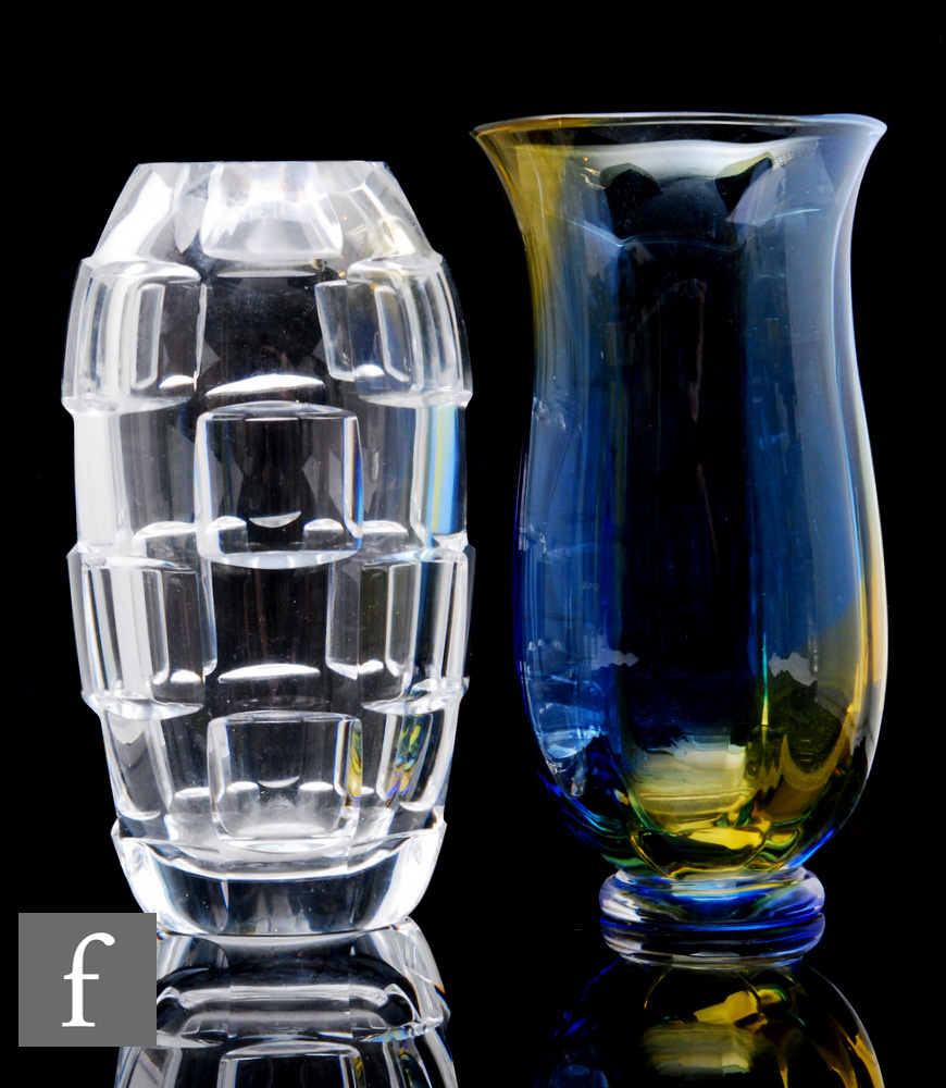 A later 20th Century Kosta Boda glass vase designed by Goran Warff of footed and fluted sleeve form,