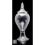 A 19th Century clear crystal glass Leech jar of shouldered ovoid form with a swept and folded