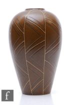 A Denby geometric pattern stoneware vase, of tapered shouldered form, the teadust style ground