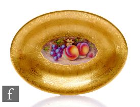A Royal Worcester fallen fruits oval dish, painted by J. Read, the rich acid cut border,