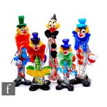A collection of mid 20th Century Italian Murano glass clowns in multicolours with applied details