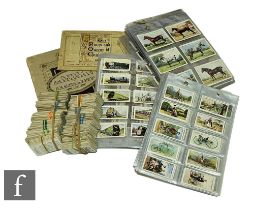 A collection of part sets of cigarette cards contained in various plastic wallets, to include