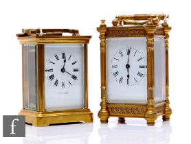 A late 19th Century French brass carriage clock with key, white enamelled dial, pierced fret