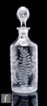 A late 19th to early 20th Century clear crystal decanter, of cylinder form with tapered facet cut