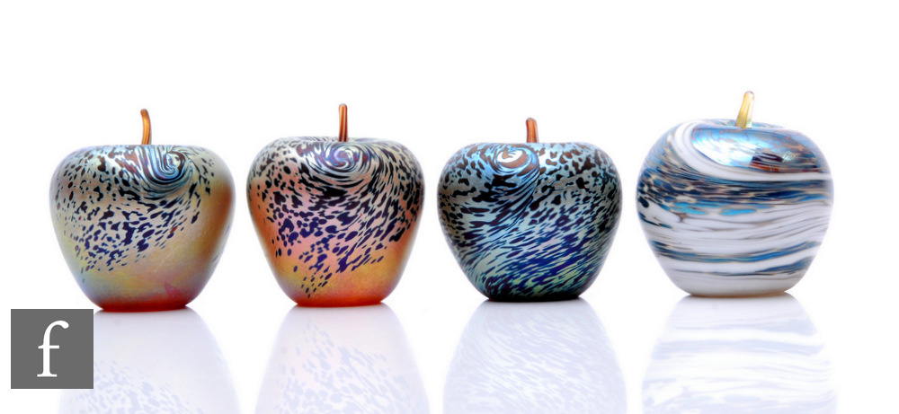 A pair of contemporary Karina Sellars for Okra studio glass paperweights, modelled as an apple,