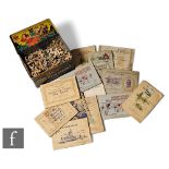 A wooden fret cut jigsaw puzzle in a 1920s  Lyons Jazz assortment biscuit tin with good lithograph